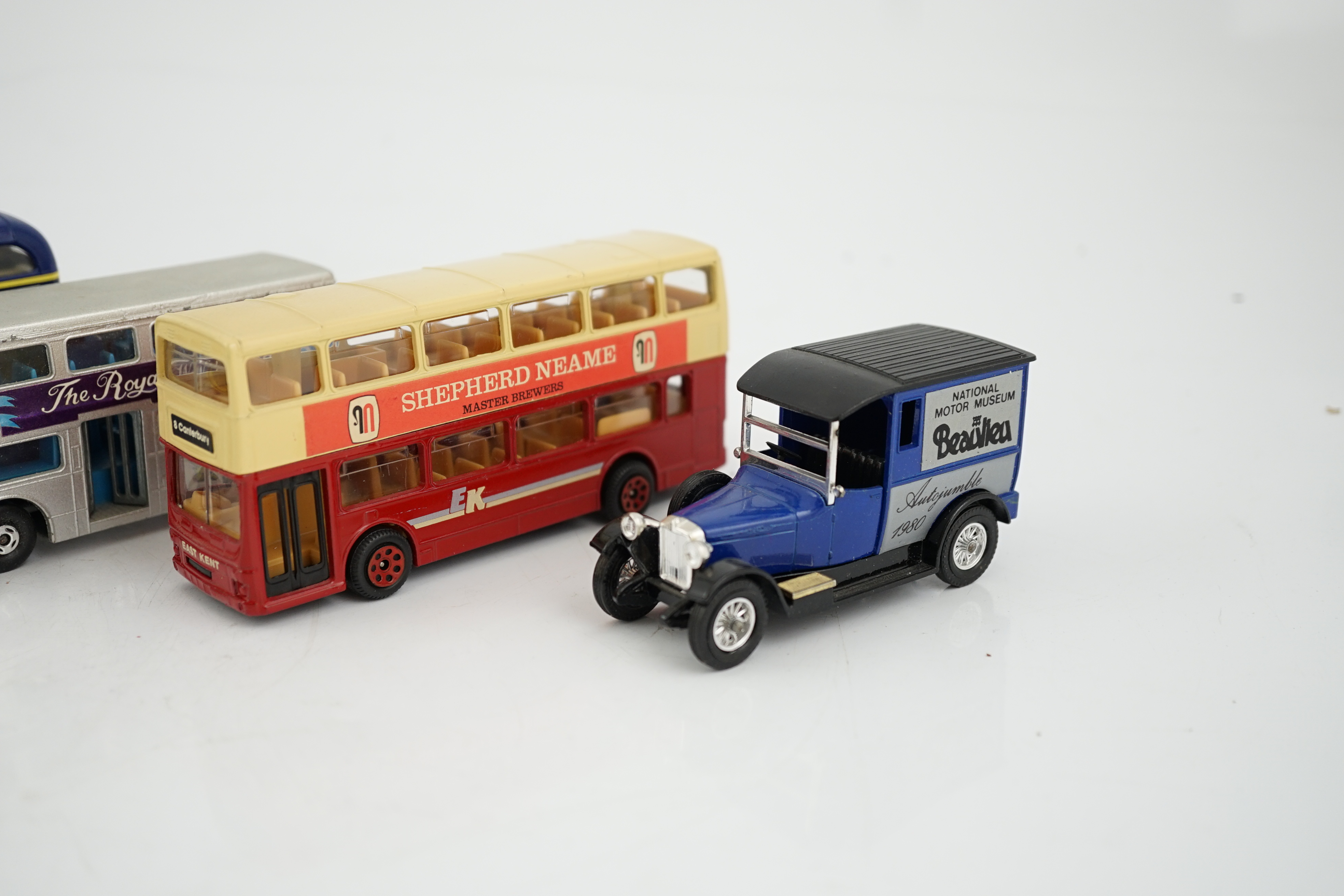 Thirty-six boxed diecast vehicles by Vanguard, Atlas Dinky, Revell, etc. including; cars, commercial vehicles, police cars, TV related cars, an Action 1:32 scale UPS van, four Jet Age military aircraft, etc. together wit